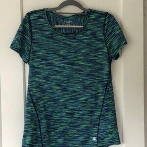 Tek Gear, Dry Tek size medium women’s athletic top. Hi/lo. Soft,stretchy. NWOT